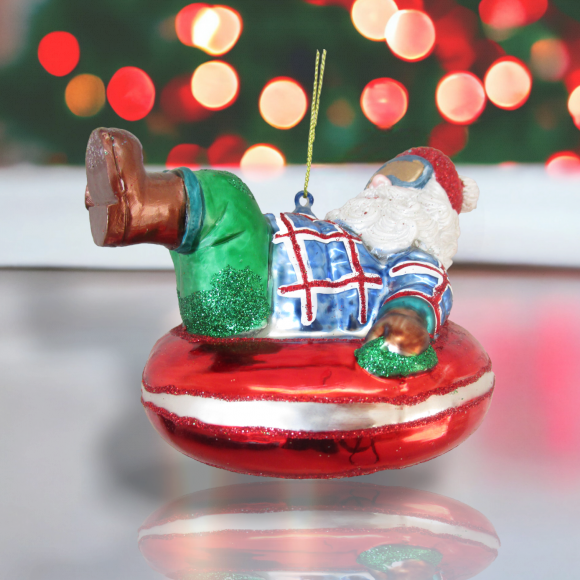 Santa on Snow Tube Orn - IN STOCK